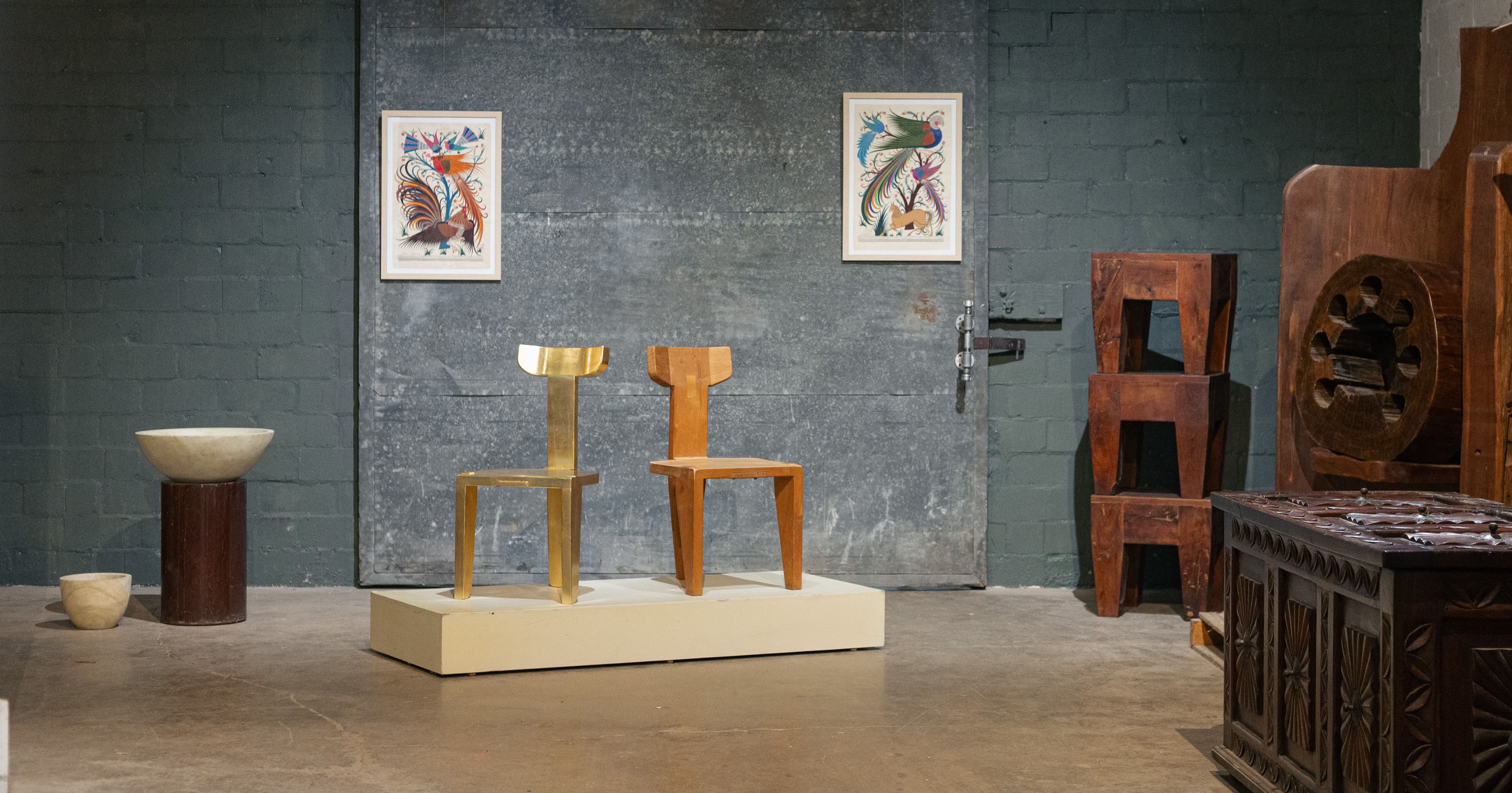 Two chairs on a pedestal